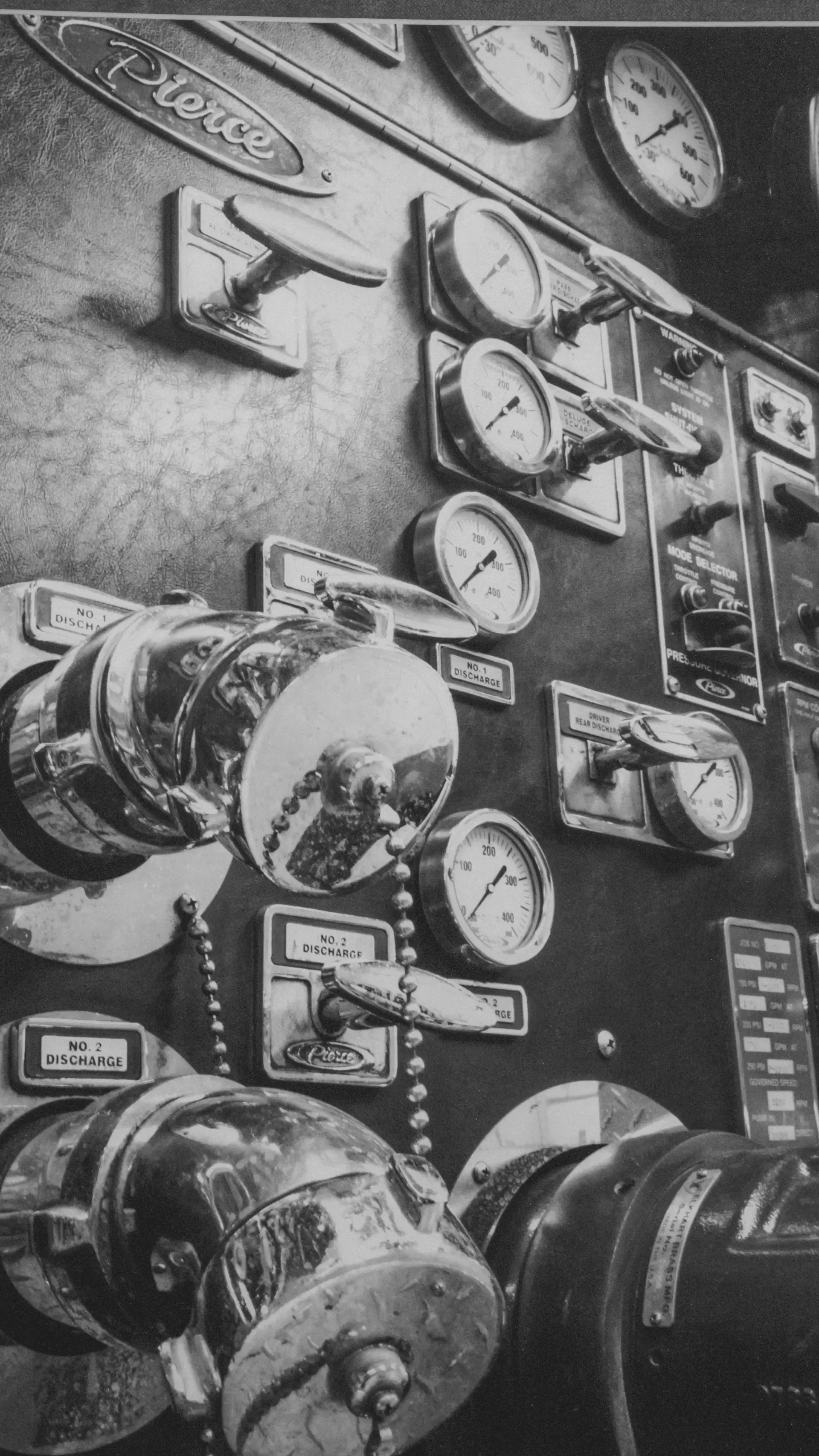 Fire truck pump panel gauges — photograph by Daniel Bower